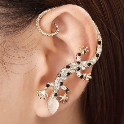 Manchettes d'oreille: boucles d'oreilles en or, argent, fil. Que sont-ils, comment porter des bijoux, comment faire des poignets de vos propres mains. Cours de maître. Une photo